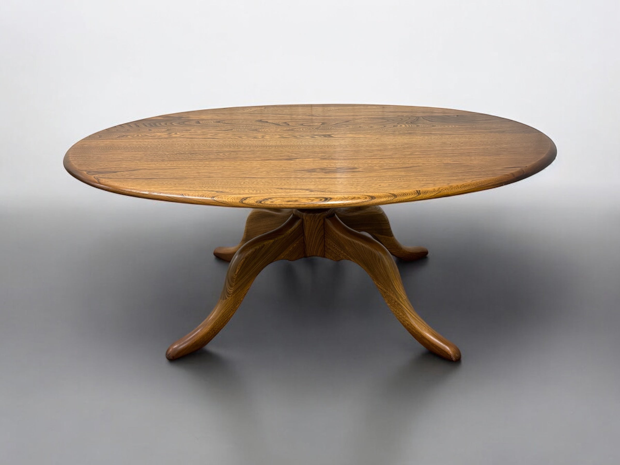 Ercol Solid Elm Oval Coffee Table on Quatrefoil Base – SE