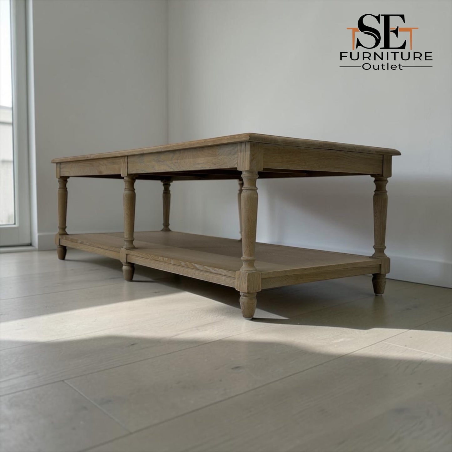 Wooden table with a shelf in a room with a light gray floor and white walls, featuring the SET Furniture Outlet logo.


