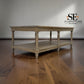 Wooden table with a shelf on a wooden floor, branded 'SE Furniture Outlet'.

